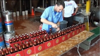在一分钟内打开啤酒瓶最多的人